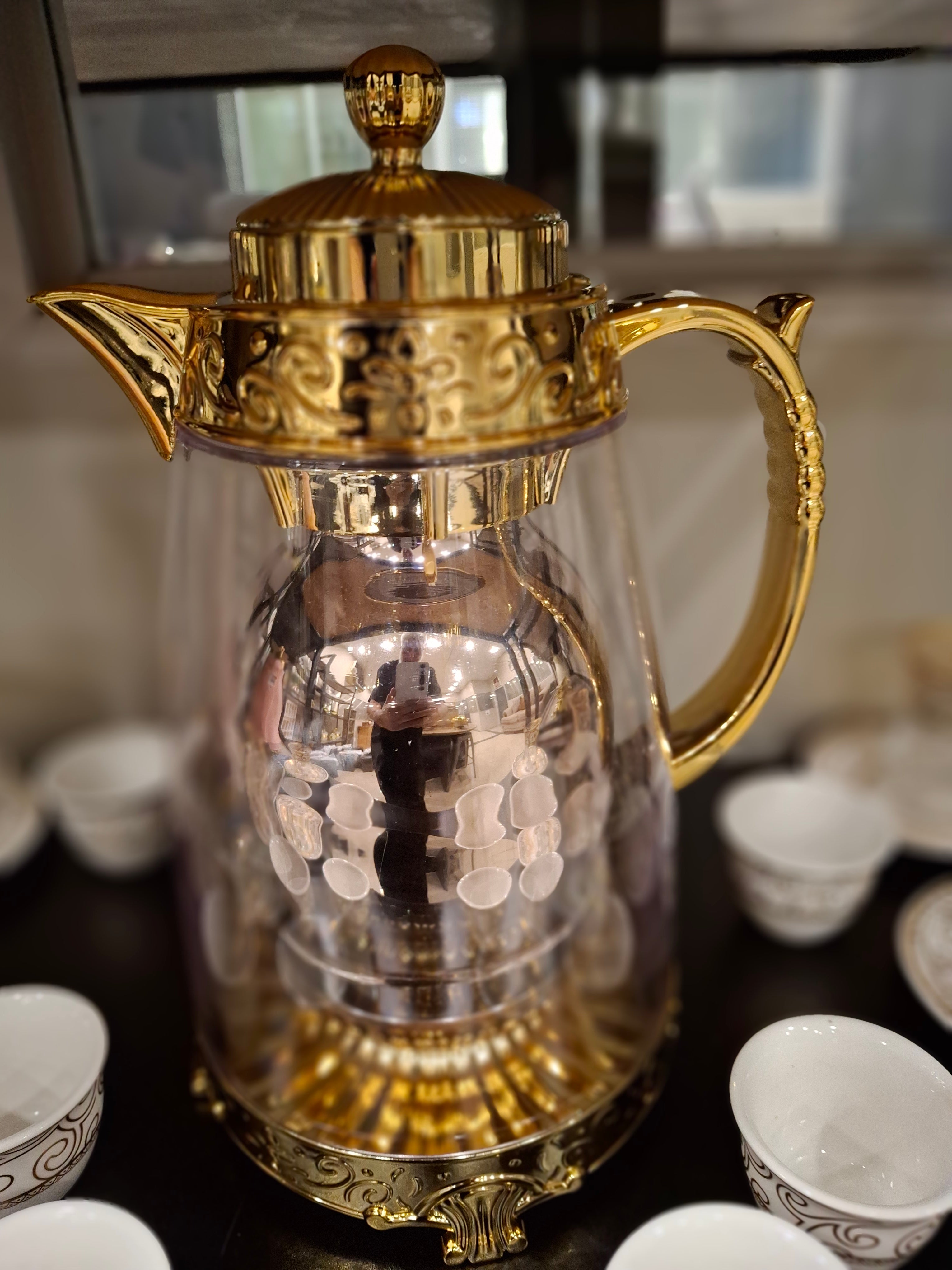 Arabian Designer Flask with glass see through outer layer Golden detailing